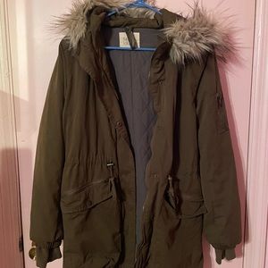 Olive color winter coat.